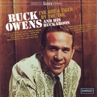 01. 1965 Buck Owens And His Buckaroos - I've Got A Tiger By The Tail.jpg